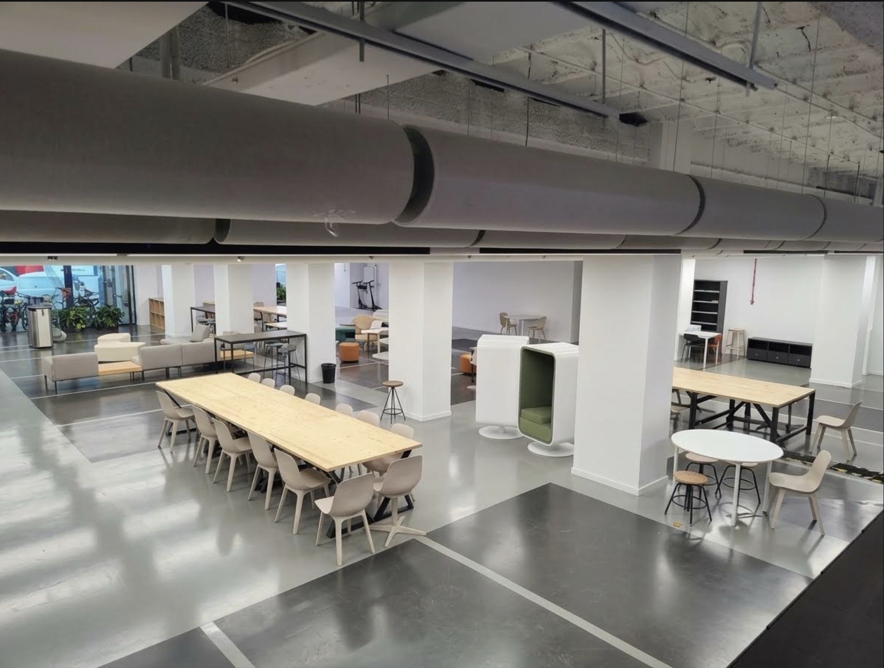 Empty co-working space before the mural