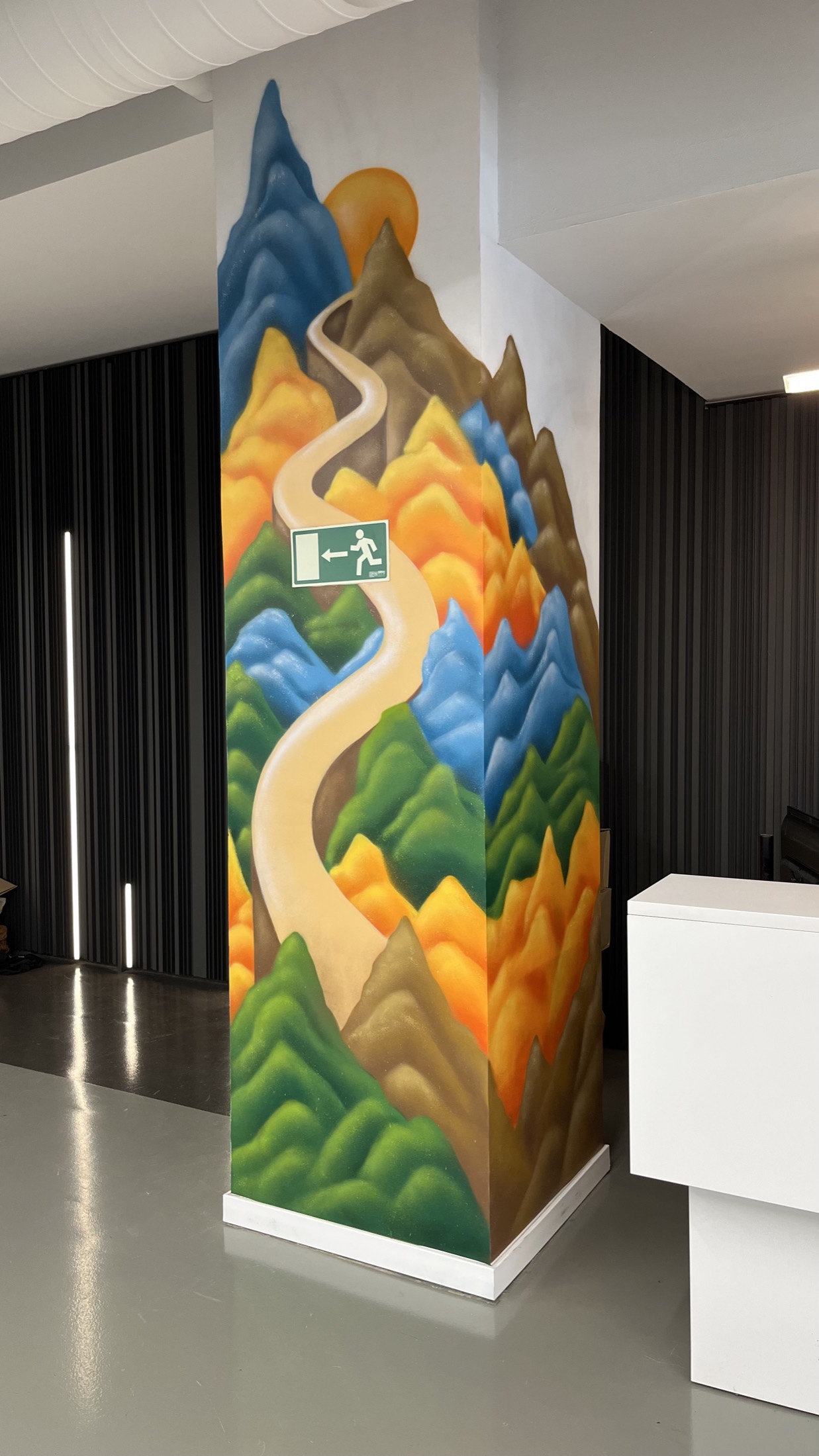 Tall mural section on a studio wall